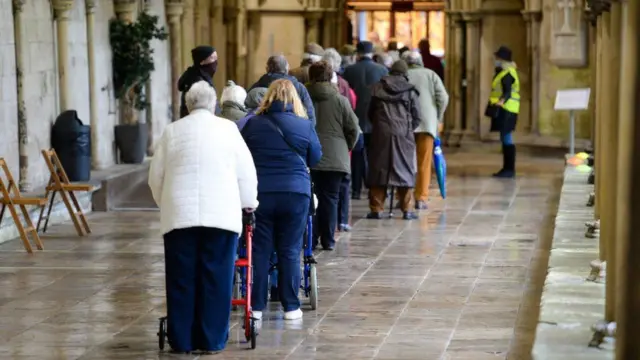 People queuing for a Covid jab