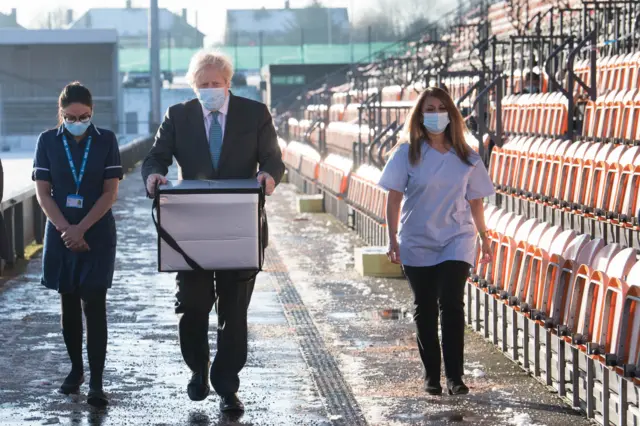 Boris Johnson on a visit to a Covid vaccination centre in north London on 25 January 2021