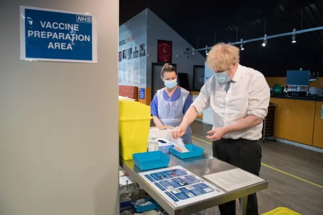 Boris Johnson visits Barnet FC ground The Hive, which is being used as a coronavirus vaccination centre