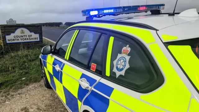 Police car at North Yorkshire border