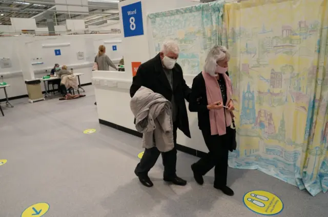 Leonora Deakin (right), 79, accompanied by James Deakin, 80, going to receive an injection of the Oxford/Astrazeneca coronavirus vaccine in Sunderland.