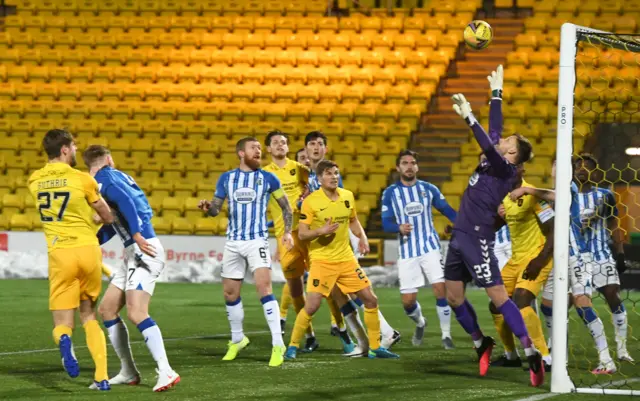 Jon Guthrie watches as his header hits the bar