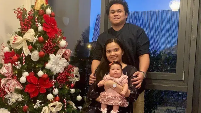 Eva Gicain with her daughter Elleana and husband Limuel