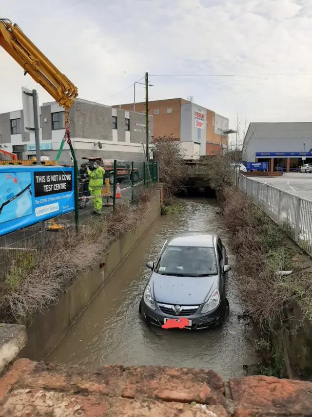 Car in brook in Loughborough