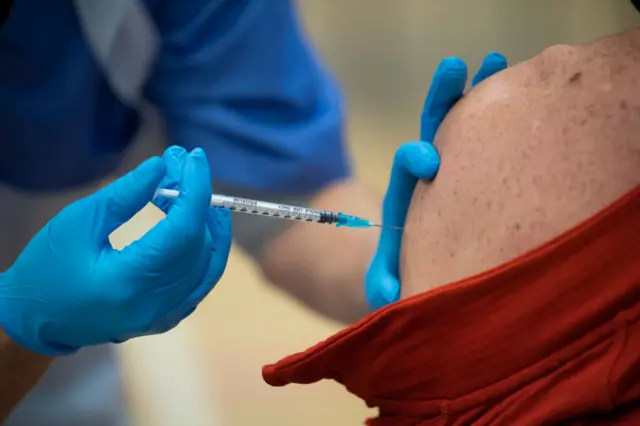 Vaccine going into arm