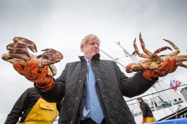 Boris Johnson on his last trip to Scotland in July when he visited Stromness Harbour