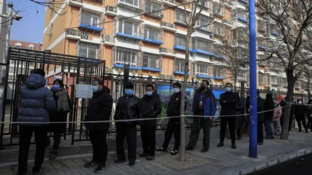Local residents line up for nucleic acid testing in Daxing district of Beijing, China, 26 January 2021. Beijing"s Daxing district started a second round mass COVID-19 testing for local residents on 26 and 27 January after a COVID-19 outbreak in this district