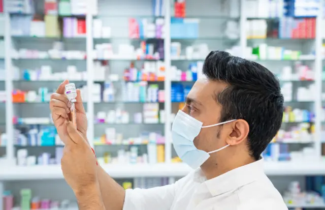 Pharmacist with Oxford vaccine