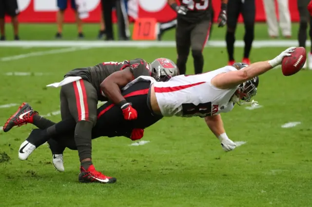 Hayden Hurst reaches for the endzone