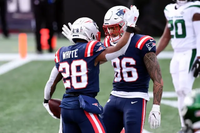 James White celebrates a touchdown