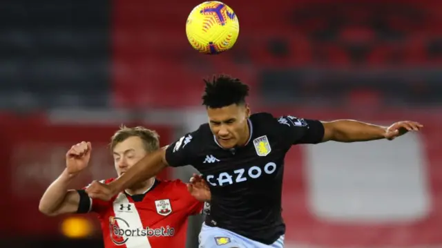 Ollie Watkins heading the ball