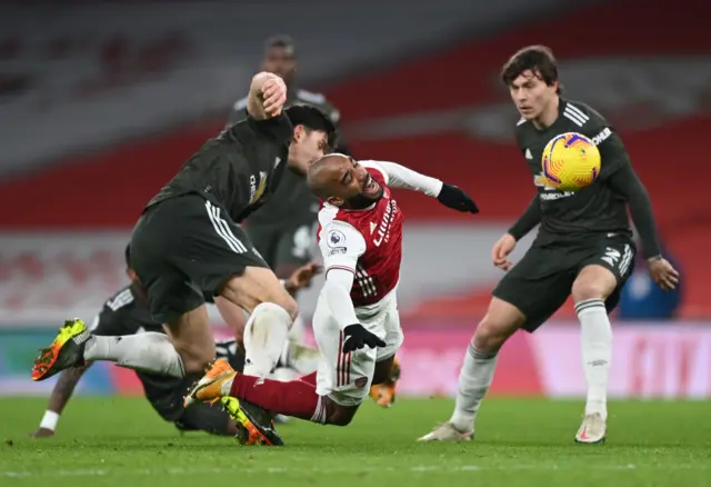 Alexandre Lacazette is fouled