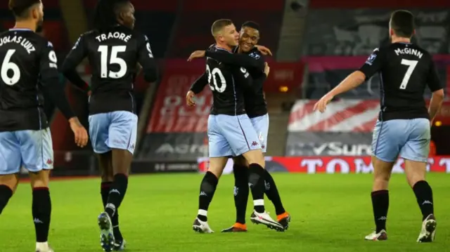 Aston Villa celebrate the opener