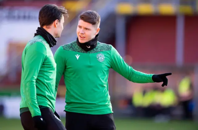 Hibs' Joe Newell and Kevin Nisbet at Tannadice