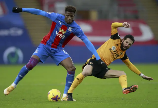 Wilfried Zaha and Joao Moutinho