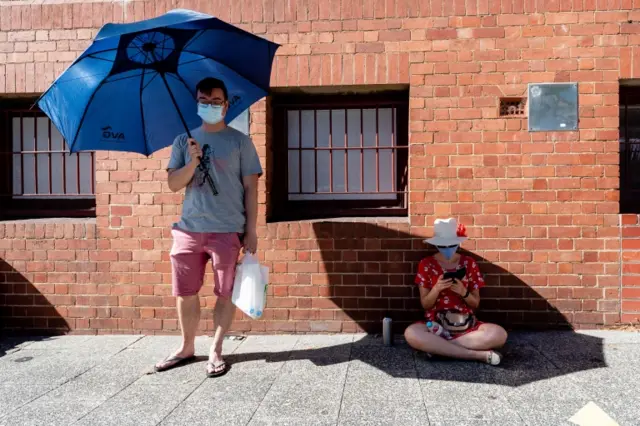 People wait to get tested for the virus at a Covid clinic at Royal Perth Hospital