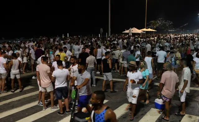 People gather in Ipanema Beach as they celebrate during New Year"s Eve, amid the coronavirus disease (COVID-19) outbreak, in Rio de Janeiro, Brazil January 1, 2021