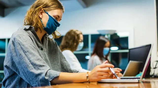 A student working at a desk