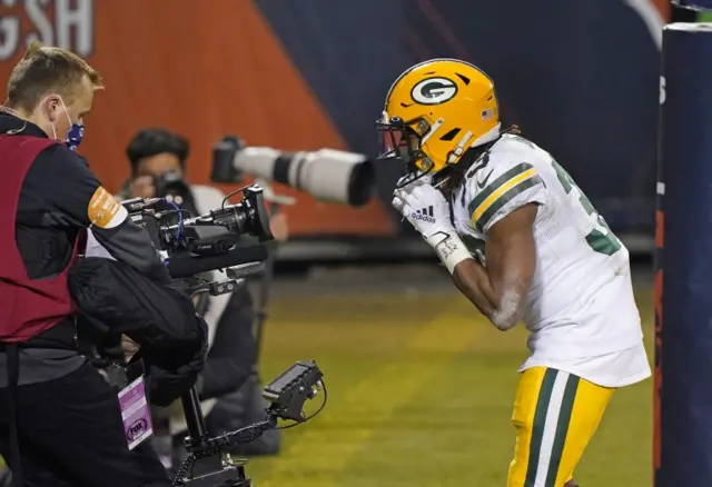 Aaron Jones celebrates a touchdown