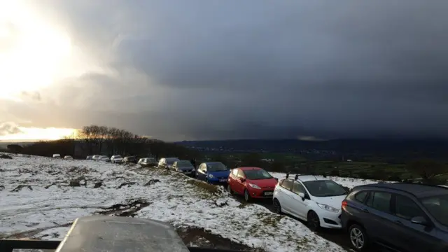 Parked cars by icy Dartmoor road