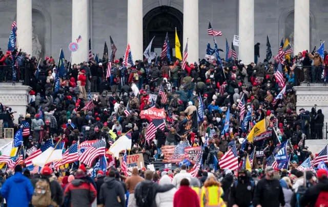 Trump supporters take over the steps of the Capitol on Wednesday, Jan. 6, 2021, as the Congress works to certify the electoral college votes