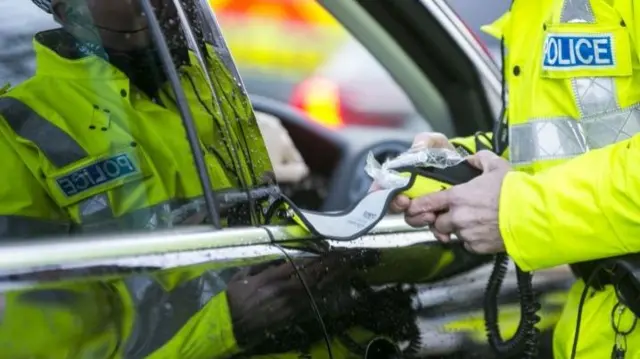 Motorist being stopped