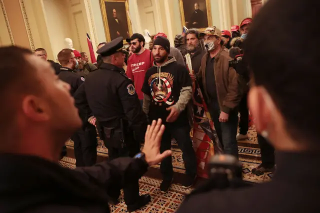 rotesters interact with Capitol Police inside the U.S. Capitol Building on January 06, 2021 in Washington, DC.