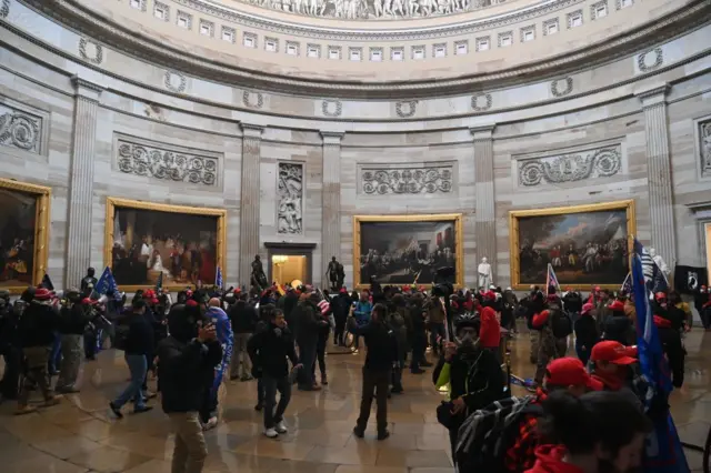 Supporters of US President Donald Trump enter the US Capitol's Rotunda on January 6, 2021, in Washington, DC