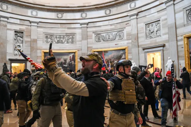 Supporters of US President Donald Trump enter the US Capitol's Rotunda on January 6, 2021, in Washington, DC