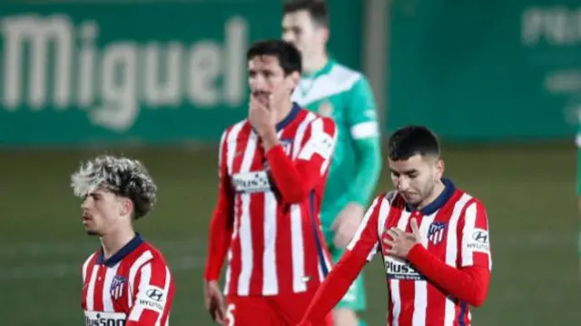 Atletico Madrid players look dejected