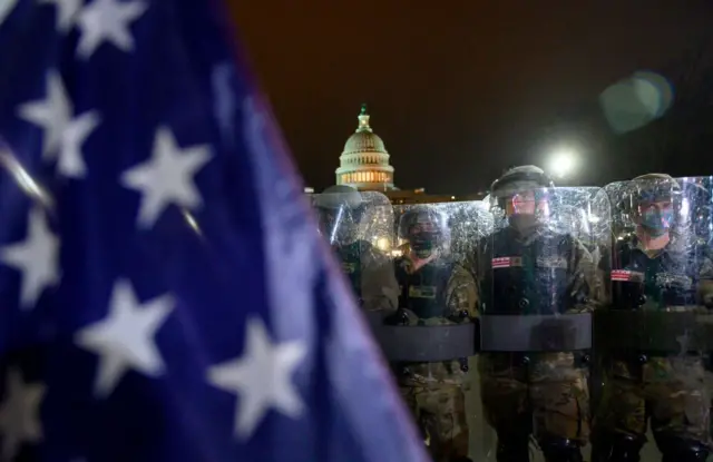 Members of the Washington DC National Guard protect the Capitol on Wednesday night