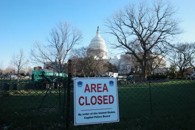 A sign says the area around Congress is closed