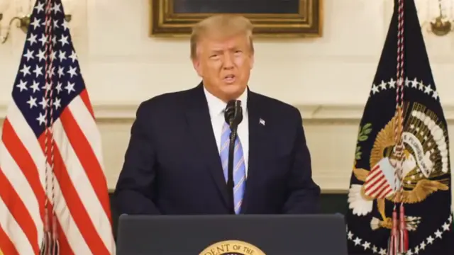 President Donald Trump gives an address, a day after his supporters stormed the U.S. Capitol in Washington, U.S., in this still image taken from video provided on social media on January 8, 2021