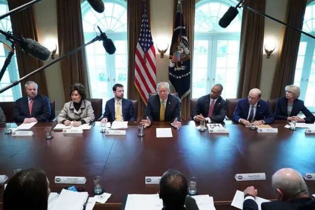 Chao (second from left) and DeVos (far right) were longtime cabinet officials