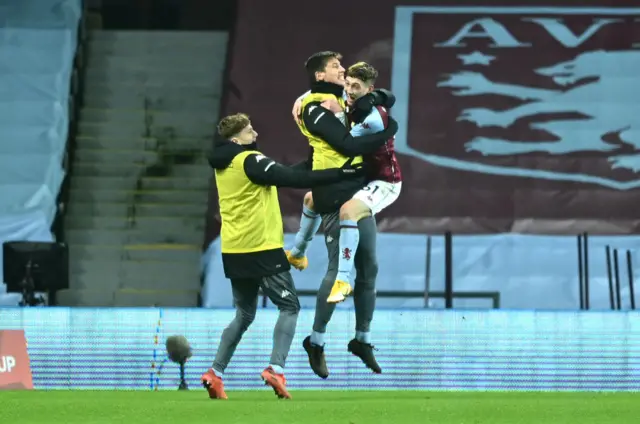 Louie Barry celebrates