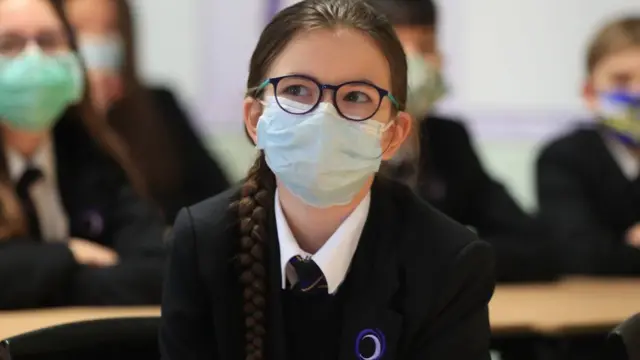 School pupil in mask