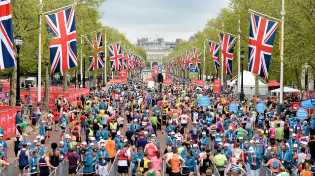 Runners on the marathon finish line on the Mall