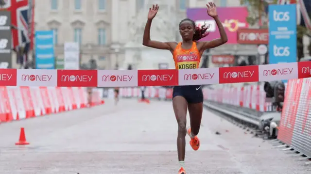 Brigid Kosgei crosses the marathon finish line