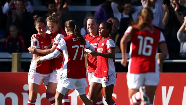 Lotte Wubben-Moy celebrates scoring Arsenal's second