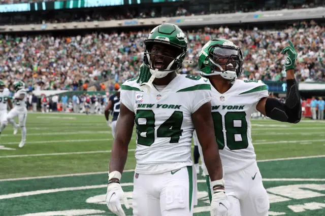 Wide Receiver Corey Davis #84 of the New York Jets scores a Touchdown and celebrates with Wide Receiver Keelan Cole #88 during the Tennessee Titans vs New York Jets game