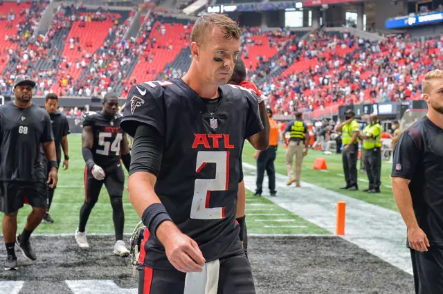 Atlanta quarterback Matt Ryan (2) walks off the field following the conclusion of the NFL game between the Washington Football Team and the Atlanta Falcons.
