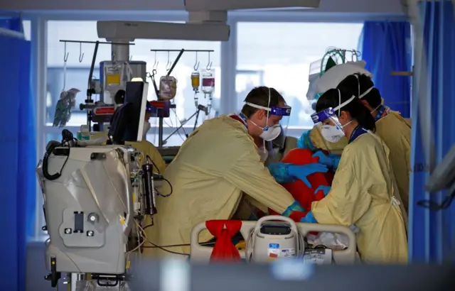 File pic of a coronavirus patient in a critical care ward