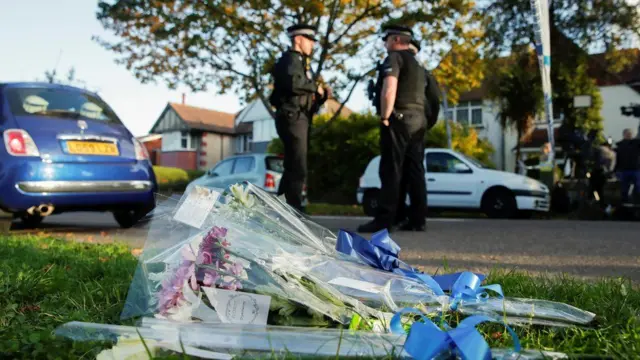 Flowers have been laid at the scene where MP David Amess was stabbed