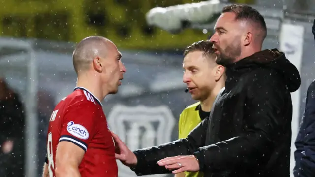 James McPake (right) was sent to the stand shortly after an argument with Scott Brown