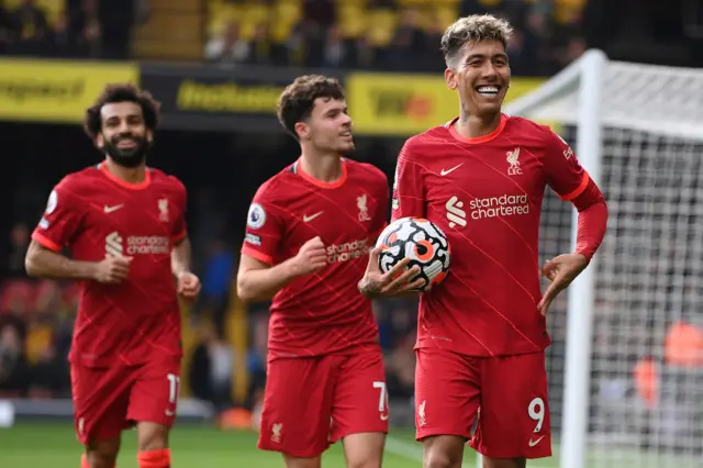 Roberto Firmino celebrates