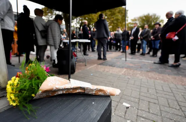 Mourners attend a vigil for late MP David Amess