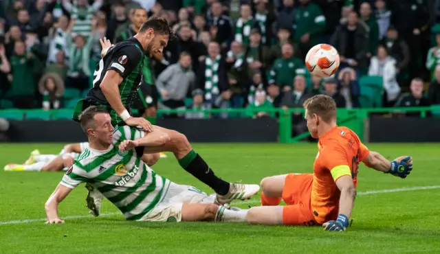 David Turnbull somehow forces the ball in for Celtic's second goal