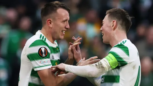 David Turnbull (left) celebrates with Callum McGregor