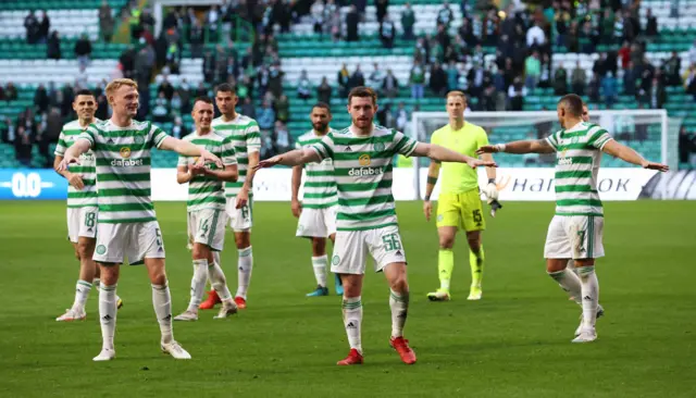 Celtic players celebrate at full-time