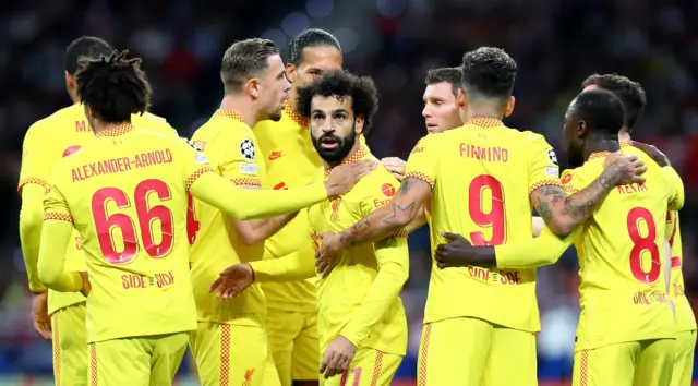 Liverpool celebrate their opening goal